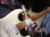 Slide guitar with a bottle of beer